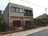 K�tlak�sos csal�dih�z